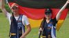 Foto: Michael Eisert / Jubel mit der Deutschlandflagge: Annabella Hettmer und Tim Krause gewannen zum Abschluss des Junioren-Weltcups Gold im Skeet-Mixed.